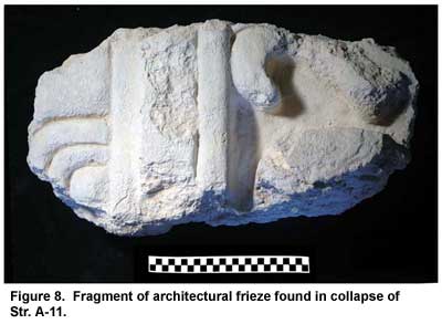 Figure 8. Fragment of architectural frieze found in collapse of Str. A-11. Click to enlarge.